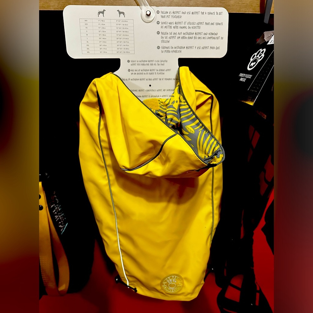 Brand new reversible rain coat size large